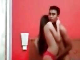 asian guy makes funny faces while he fucks his tiny pussy gf