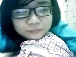 Nerdy asian porn girl has cybersex with her bf on skype